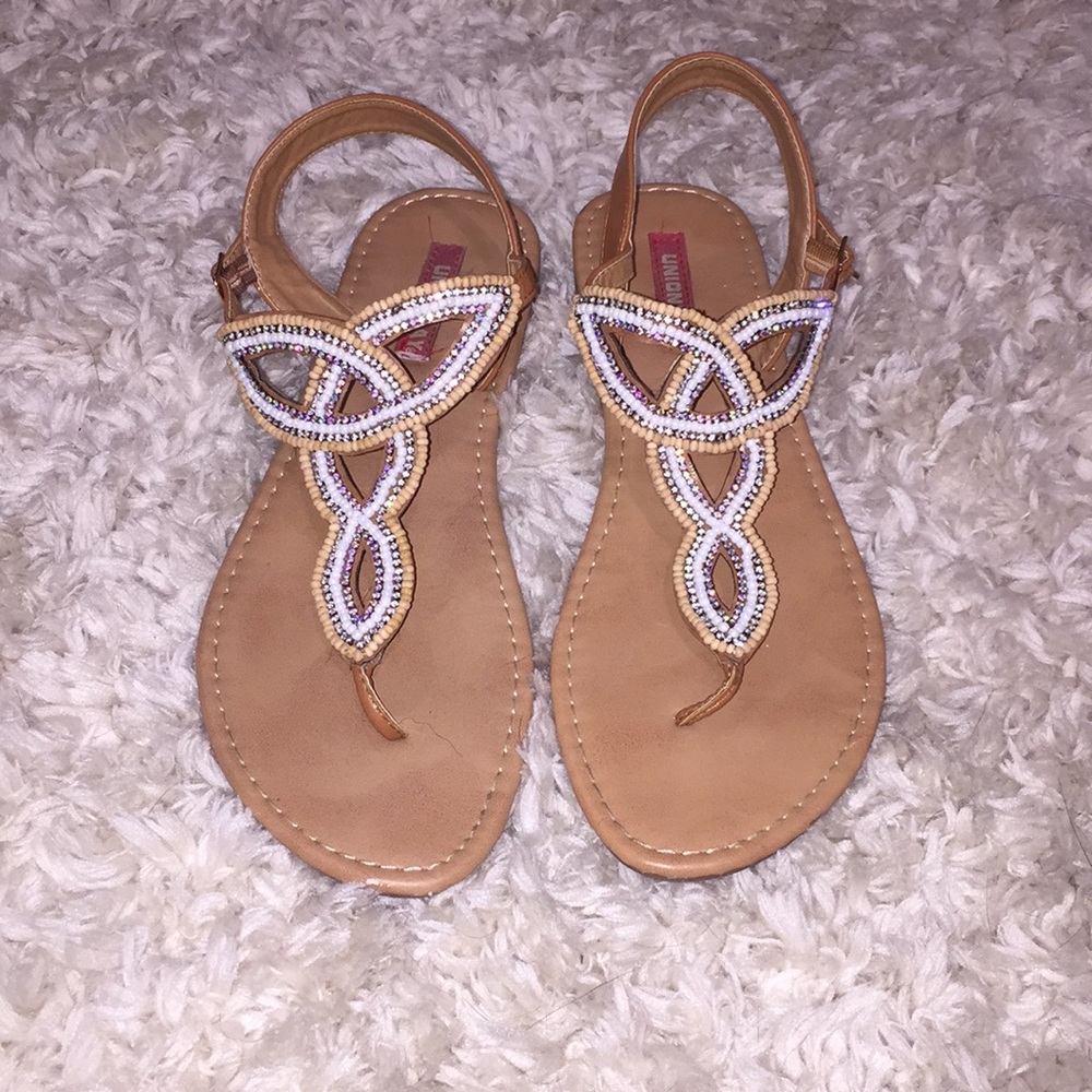 Beaded sandals.